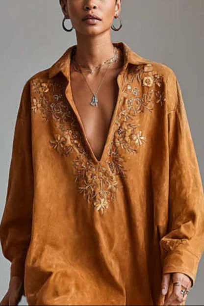 loose-fitting shirt dress with floral embroidery on the collar